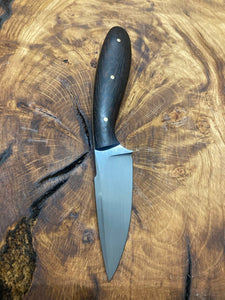 Small false edge hunter with false edge and pocket sheath