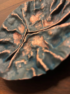 Small sculpted copper bowl