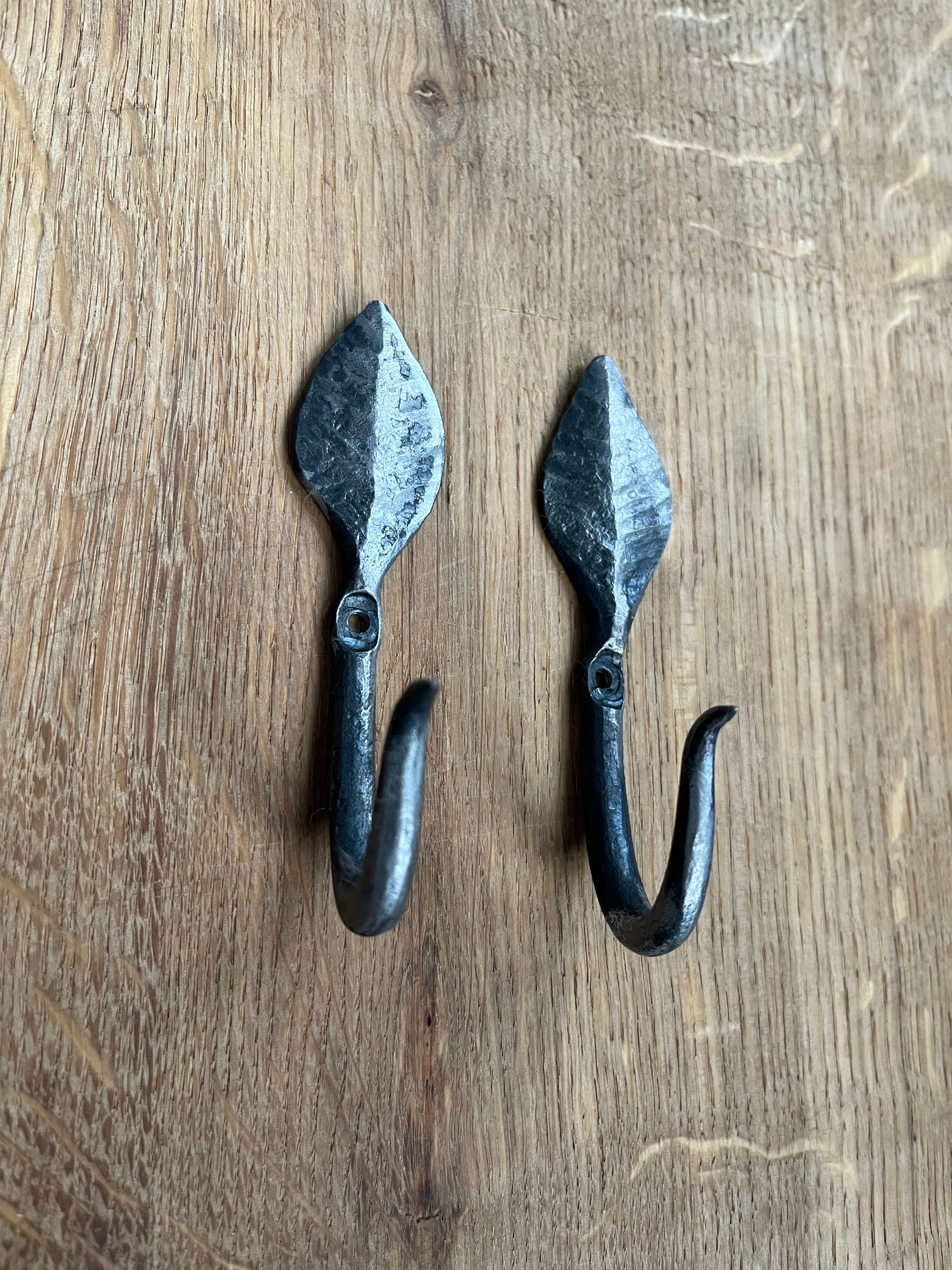 forged pair of small leaf hooks