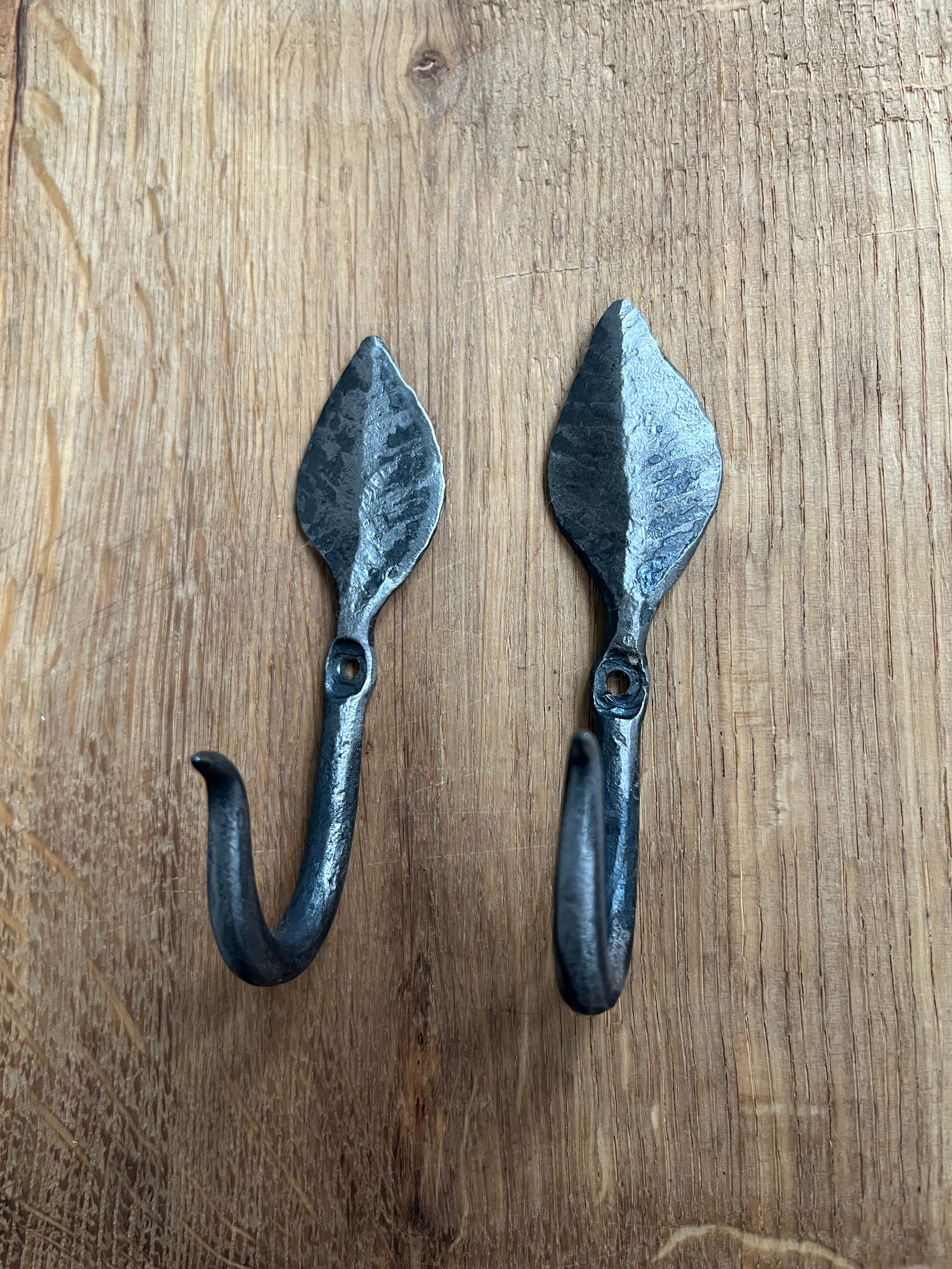 forged pair of small leaf hooks