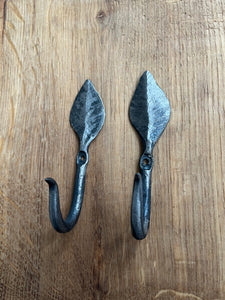 forged pair of small leaf hooks