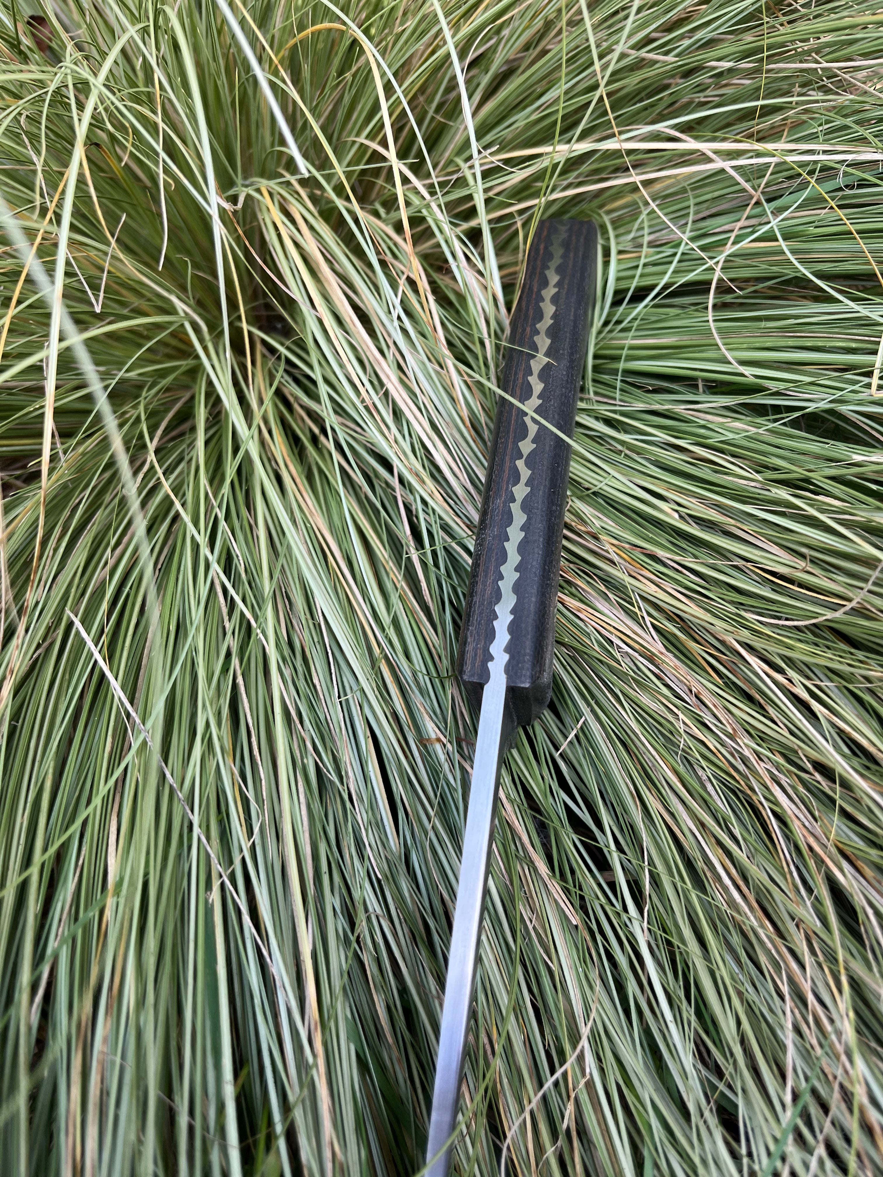Drop point hunter/camp knife with leather sheath